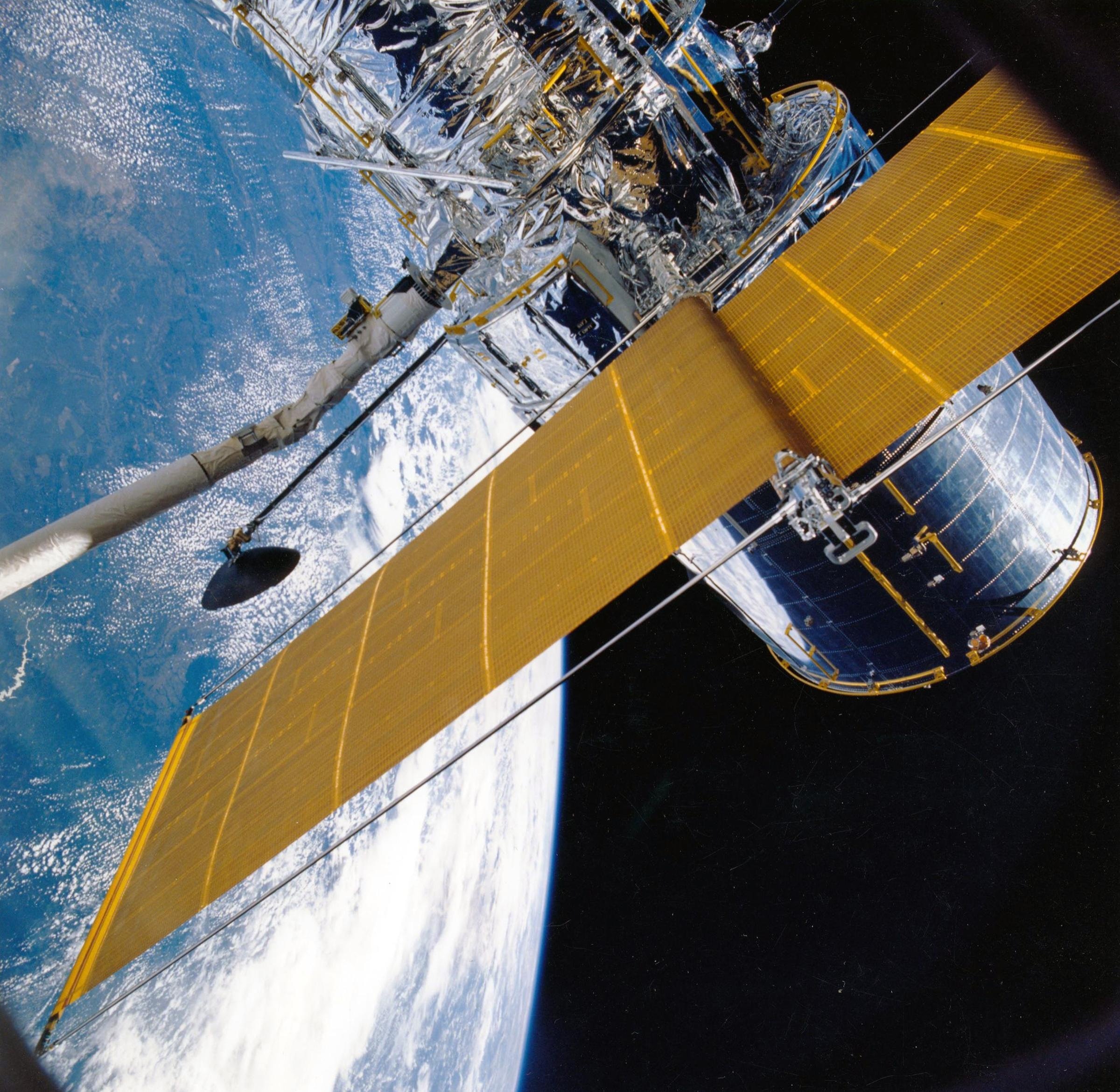 A telescope orbiting Earth.